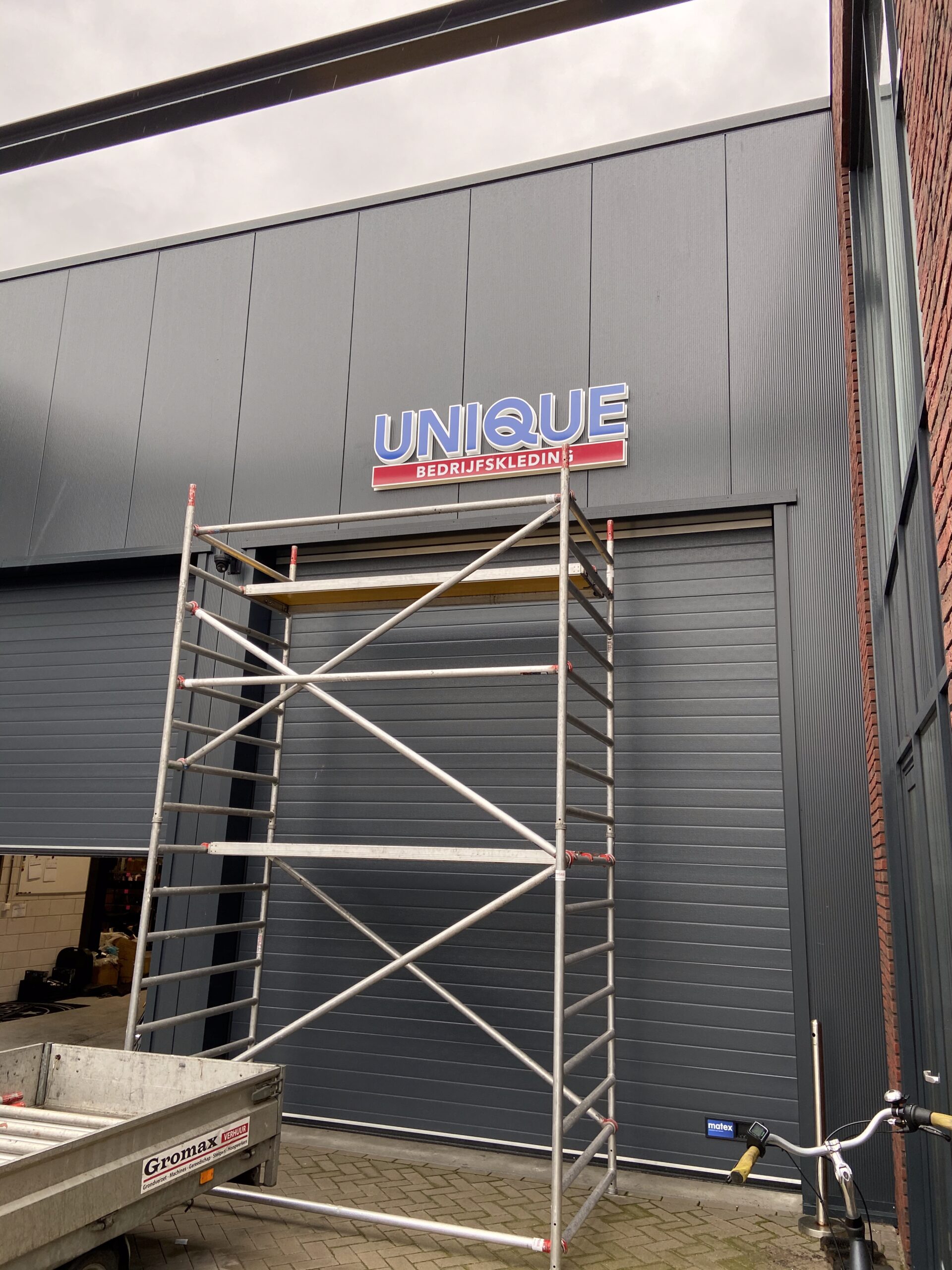 Gevelreclame Unique bedrijfskleding Bodegraven