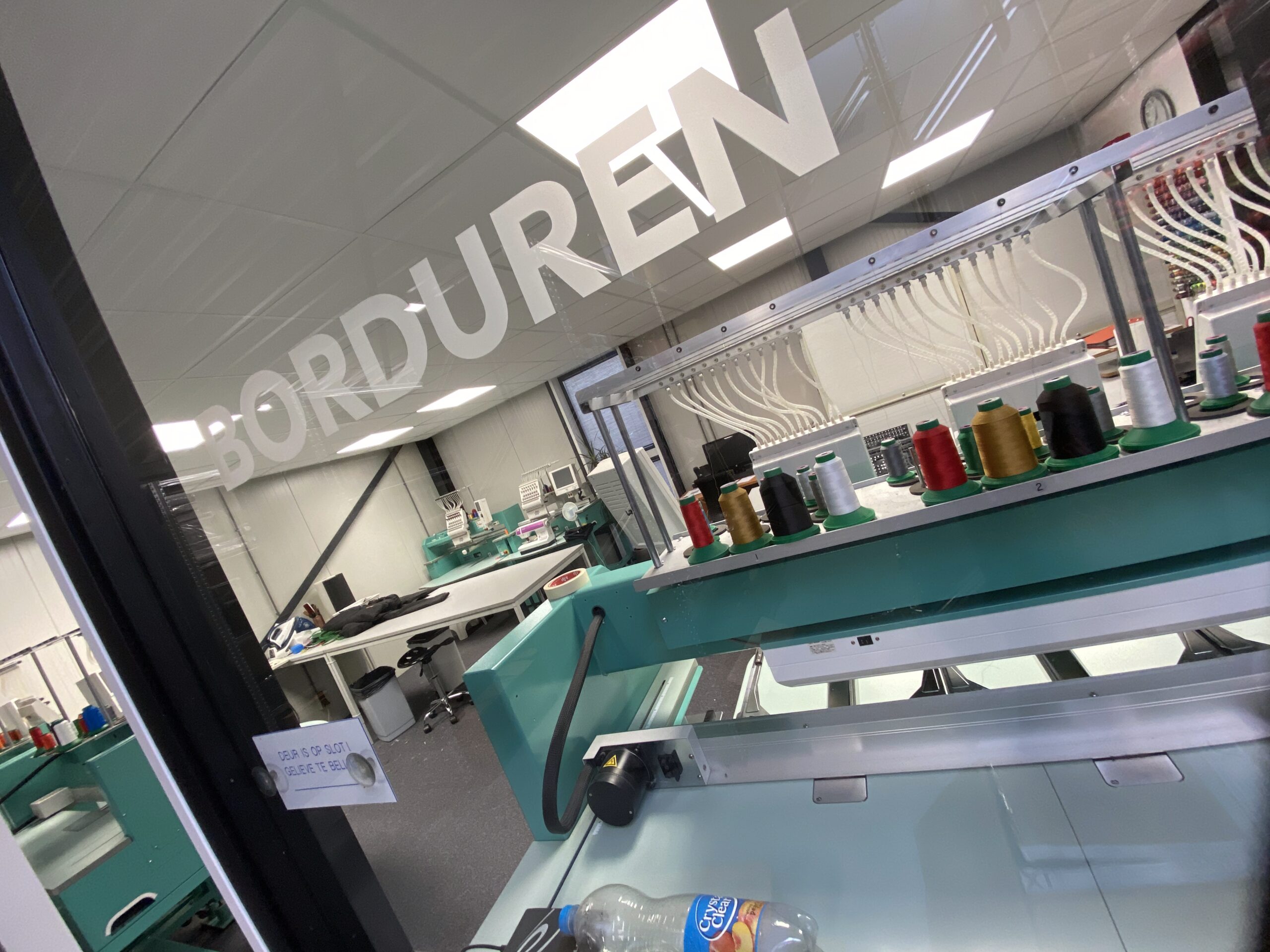 Raambelettering Unique bedrijfskleding Bodegraven